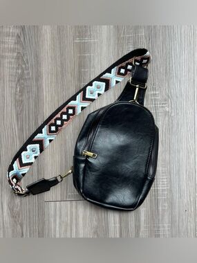 Black leather crossbody bag with colorful strap